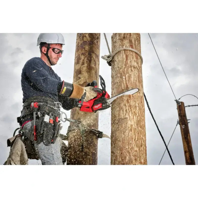 Red cordless handle chainsaw featuring Milwaukee M18 FUEL™ for professional use
