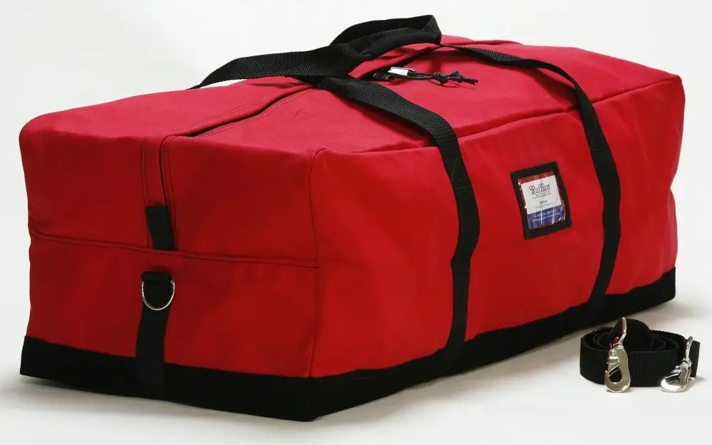 Red turnout gear bag with black straps and center zipper for durable gear storage