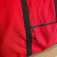 Red Academy Turnout Bag with black straps and zipper for turnout use