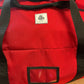 Red duffel bag with black straps for Academy Turnout Bag and turnout bag storage