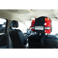 Red emergency medical Refuge pack in Travel FAK mounted between car headrests