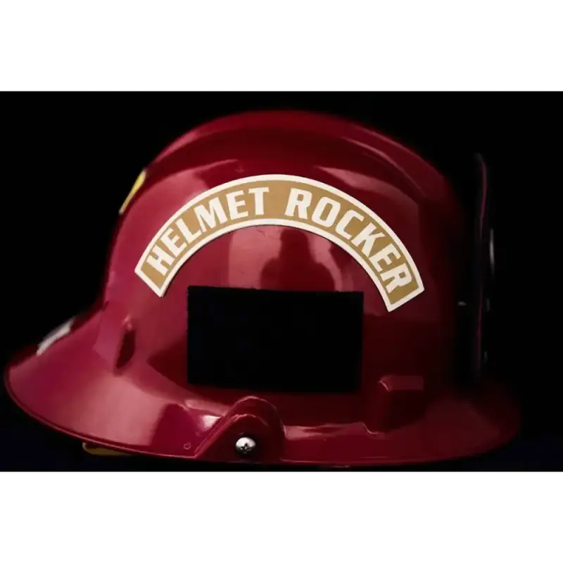 Red firefighter helmet with HELMET ROCKER, featuring 3M™ Scotchlite™ reflective material