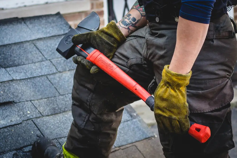 Red-handled sledgehammer with black head, a USA patented striking tool with composite handle