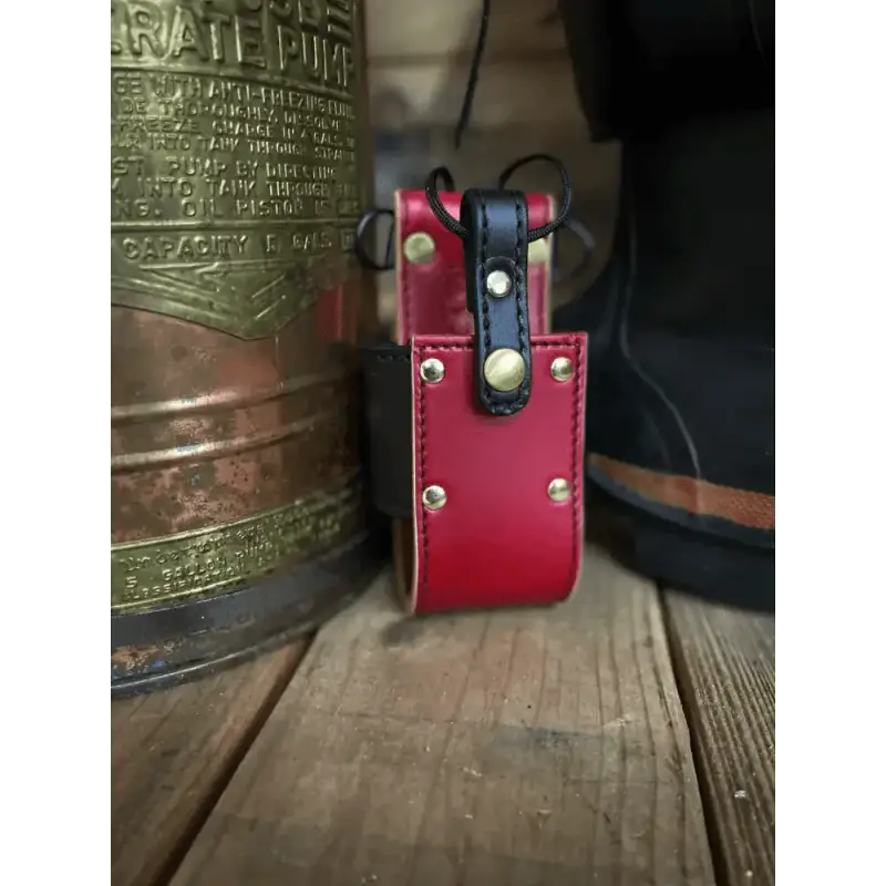 Red leather case with metal studs and black strap for Universal Radio Bucket