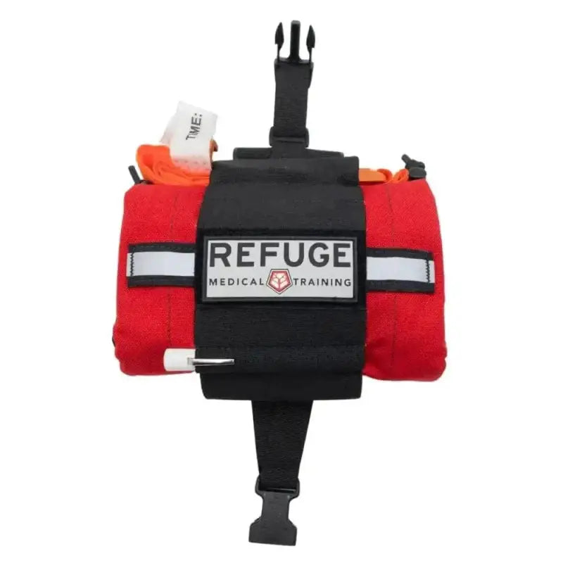 Red medical training kit with black straps and REFUGE logo for Travel FAK, empty pouch