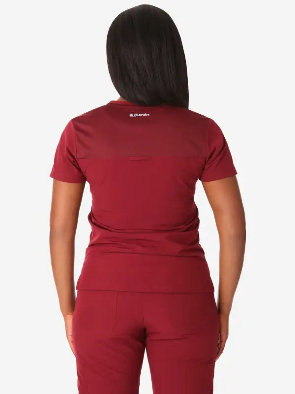 Red Women’s Tuckable One-Pocket Scrub Top displayed from the back