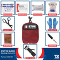 Red STOP THE BLEED bleeding control kit with QuikClot Premium and first aid supplies
