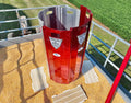 Red metal grain chute with safety labels for Grain Entrapment Rescue System-TuffKote