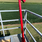 Red metal pole with angled top on platform for JPZ Rescue Auger grain entrapment rescue system