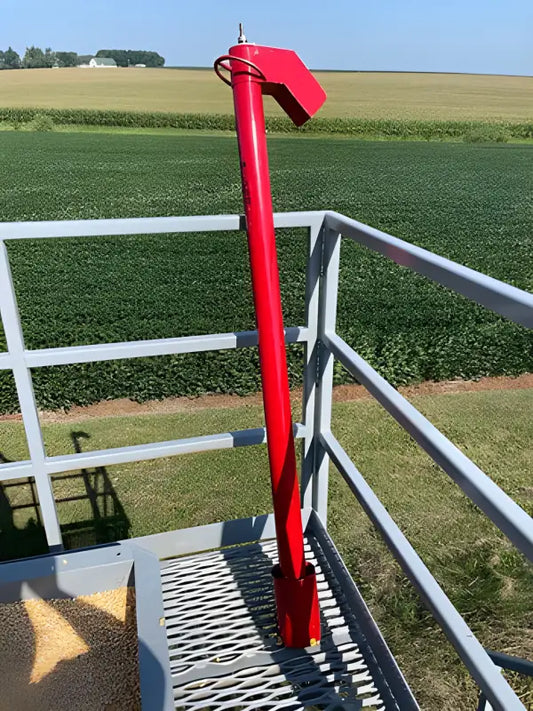 Red metal pole with angled top on platform for JPZ Rescue Auger grain entrapment rescue system