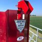 Red metal rescue tube holder labeled Great Wall of Rescue for JPZ Rescue Auger system