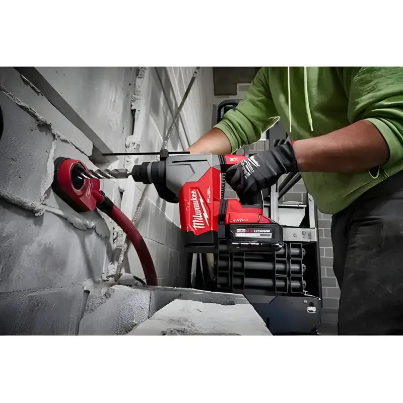 Red Milwaukee 2915-20 M18 FUEL 1-1/8’’ SDS Plus Rotary Hammer with dust collection attachment