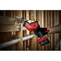Milwaukee 2719-20 M18 FUEL Hackzall cutting through wood using Powerstate Brushless Motor