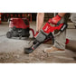 Red Milwaukee 2916-20 M18 FUEL™ 1-1/4’’ D-Handle Rotary Hammer breaking concrete