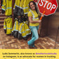 Red octagonal STOP sign held near UHV997 Women’s HiVis Short Sleeve Tee and safety vests