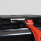 Red plastic ratchet strap secured to Aluminum Quick Release Mounting System by Outer Limit Supply