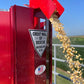 Red popcorn vending machine labeled Great Wall of Rescue for JPZ Rescue Auger grain entrapment