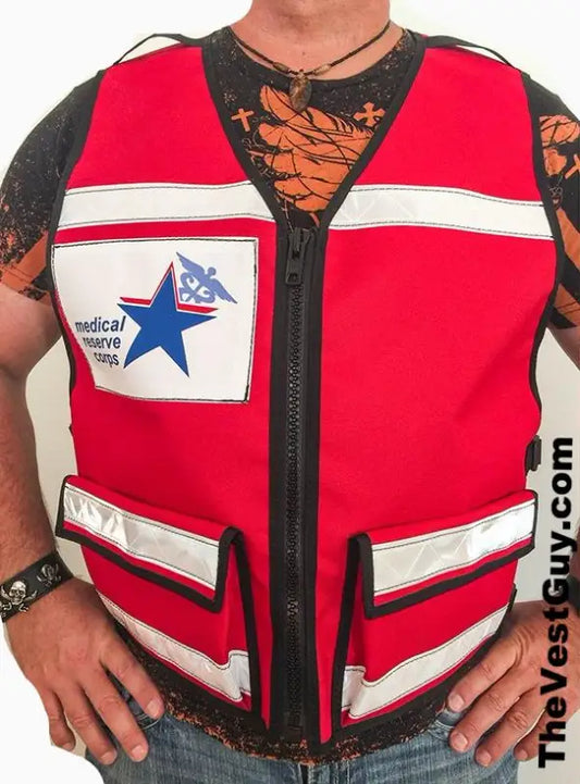 Red Medical Reserve Corps vest with white reflective stripes and blue star patch