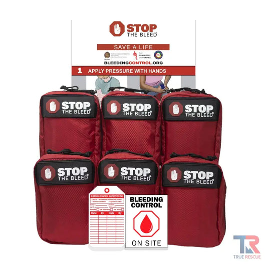 Red Stop the Bleed trauma kits in a display rack for bleeding control cabinet solutions