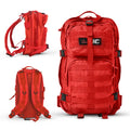 Red tactical backpack shown with Tactical Trauma Kit for emergency trauma response