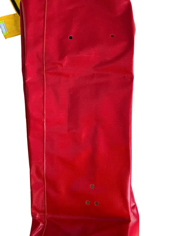 Red vinyl ElkHart Brass nozzle cover with ventilation holes for firefighting equipment