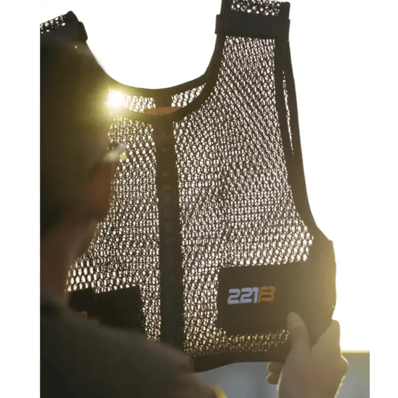 Reflective mesh Maxx-Dri Vest with black trim and 227B text for cold weather body armor