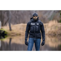 Police officer in tactical gear showcasing Rendition Jacket Elite with smart pockets