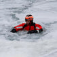 Rescue worker in red suit using ARM-LOC Rescue System for water rescues and victim pulls