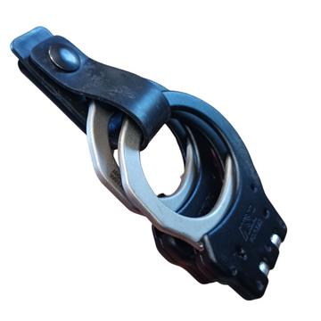 Minimalist Cuff Holder with spring steel belt clip designed for easy accessibility and secure cuff storage.