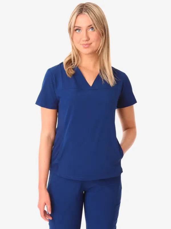 Royal blue women’s stash-pocket scrub uniform with v-neck top and matching pants