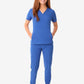 Royal blue women’s stash-pocket scrub with white sneakers for a stylish medical look