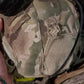 Camouflage military-style cap in desert pattern with RT2 Ballistic High Cut Helmet