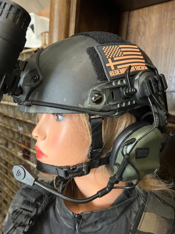 Black RT2 Ballistic High Cut Helmet with American flag patch and headset by Redemption Tactical