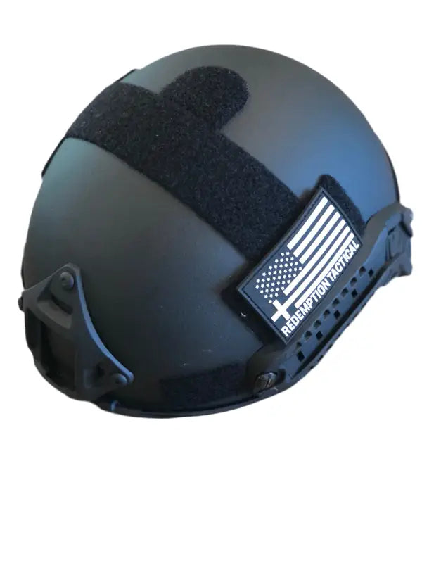 Matte black RT2 Ballistic High Cut Helmet with American flag patch from Redemption Tactical