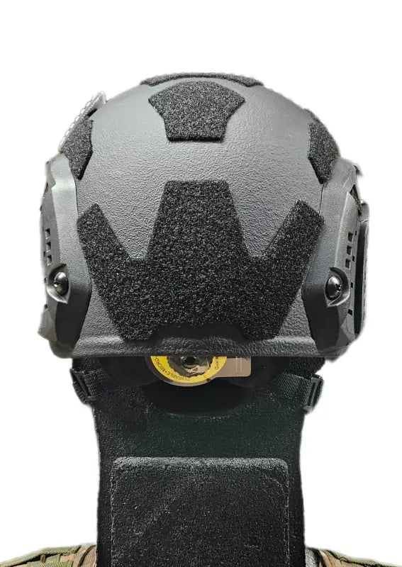 Black tactical helmet with hexagonal panels from Redemption Tactical RT2 Ballistic High Cut