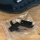 Black plastic gun parts in a clear bag for RT2 Ballistic High Cut Helmet by Redemption Tactical