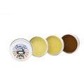Four circular tins of beard wax with skull logo in Sampler Pack for mustache & beard