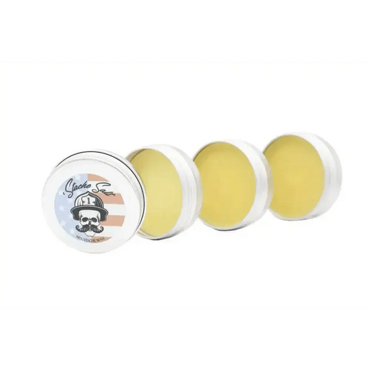 Three round tins of yellow beard wax with vintage-style labels in a sampler pack