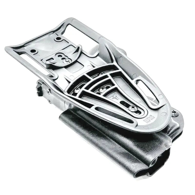 Silver-colored adjustable firearm holster for Glock 43X with light mounted, ideal for first responders