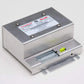 Silver metal electronic device from Whelen Howler Low-Frequency Siren Set for first responders