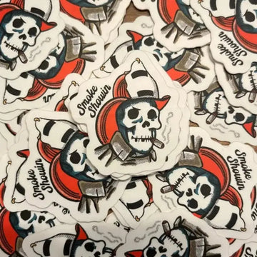 Repeating Smokin Skull sticker design featuring red and black pirate theme elements