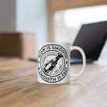 White coffee mug with logo that says Slow is smooth, smooth is fast for first responders
