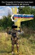 Soldier in camouflage with black face mask wearing CRUSADER 2.0 body armor by Redemption Tactical