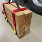 Stack of wooden blocks held together with Cribbing Strap Short-FFCS8 secure straps