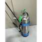 Stainless steel water bottle with blue straps and green cap on Extinguisher Carrying Sling