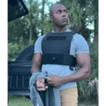 Black tactical bulletproof vest over gray t-shirt for Stealth Low Visibility Concealed Body Armor