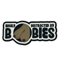 Sticker design featuring easily distracted text and brown bird for Fun Size Boobs PVC Patch