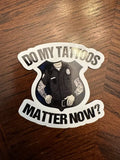 Sticker of tattooed police officer asking if tattoos matter for first responders