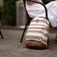 Striped beige and brown Echo EDC Backpack resting on pavement, ideal CCW backpack