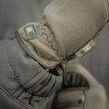 Tactical glove with digital display featuring M-Tac Gloves Scout design for durability